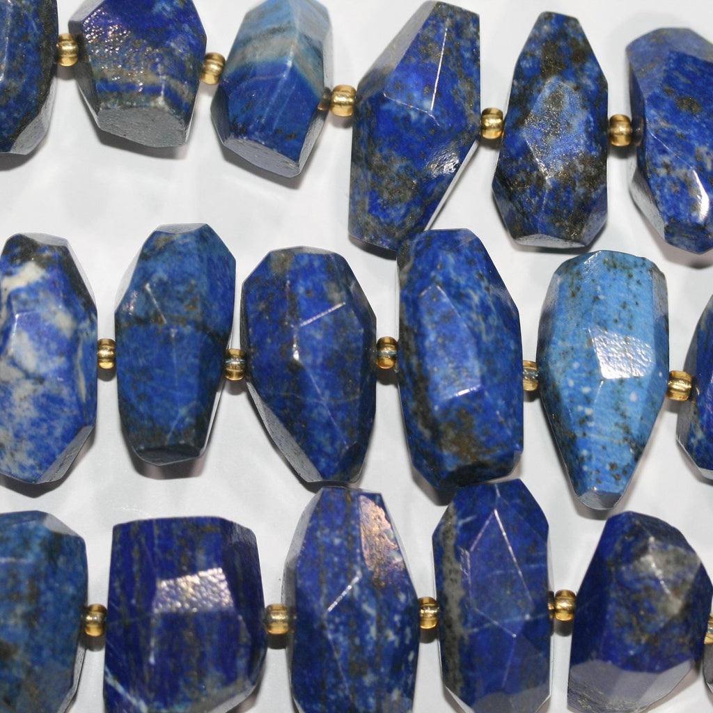 Cuentas facetadas de lapislázuli de 40 cm (30 x 18 mm). Hilo de 40 cm aprox.