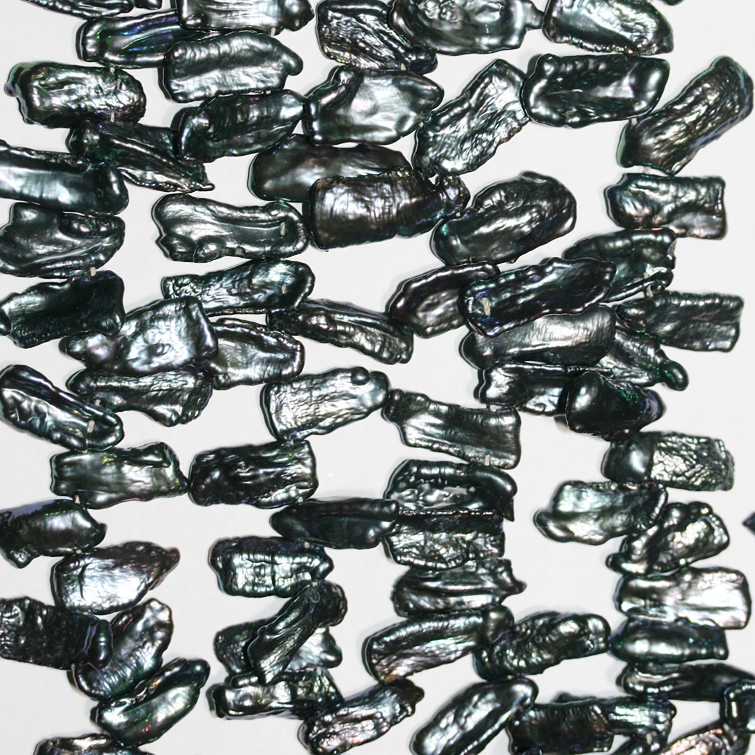 Perle Biwas noire d'eau douce St 16" St 20x9mm. Longueur approximative : 40 cm