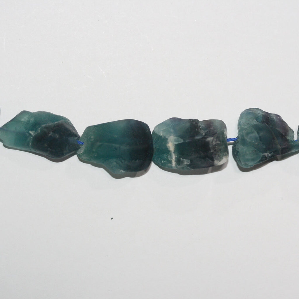 Cuentas de fluorita sin pulir de 16", 20-25 mm aprox., hilo de 40 cm.
