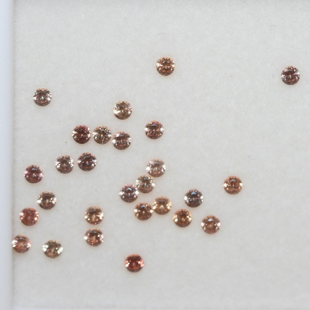 Saphirs orange ronds à facettes, lot de 2 mm environ (environ 1 carat).