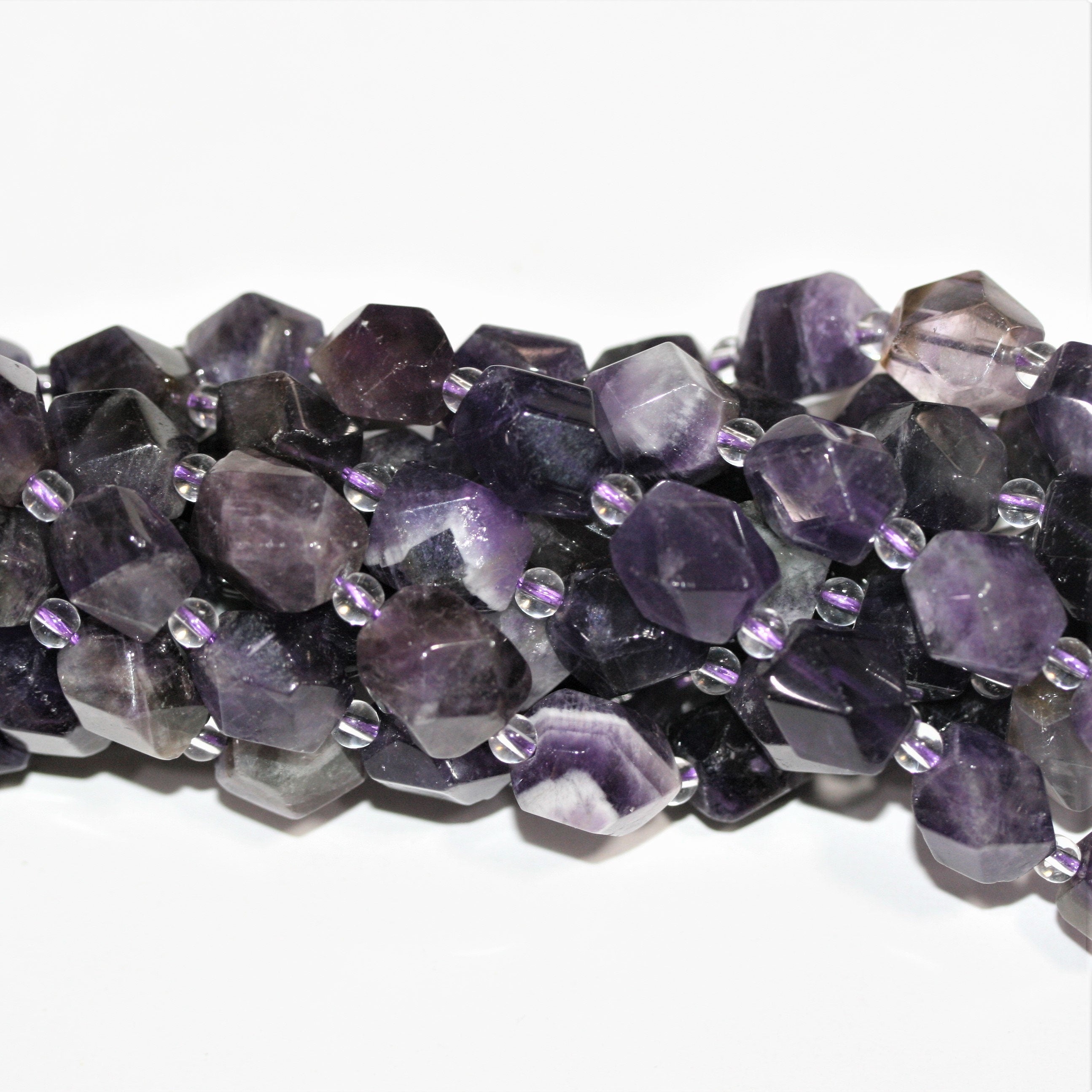 Cuentas facetadas de amatista santa de 16", 15 x 10 mm. Longitud aproximada: 40 cm.