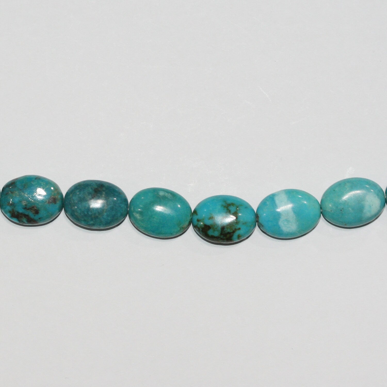 16" Cuentas Ovaladas Lisas Turquesa 15x11mm.aprox.- Hilo 40cm.