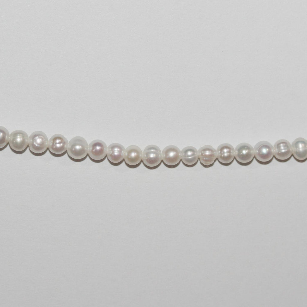 Perla de agua dulce redonda de 14" de St. 3,5-4 mm. - Hilo de 37 cm.