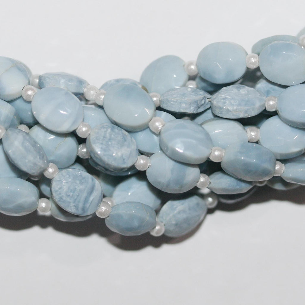 Cuentas ovaladas facetadas de ópalo azul de 16" de 9 x 7 mm - Hilo de 20 cm.