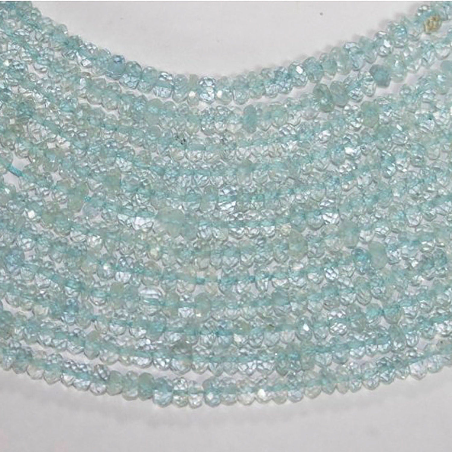 13" St Aquamarine Faceted Rondelle 3.5x2mm.-Strand 34cm.