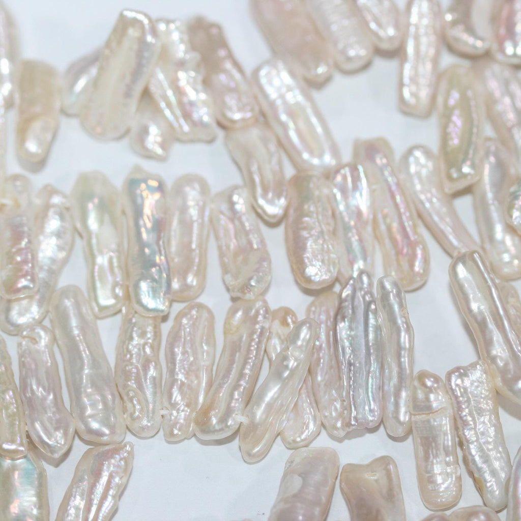 Perlas Biwas blancas de agua dulce de 17", 20 x 6 mm (aprox.), tira de 41 cm. Precios al por mayor.