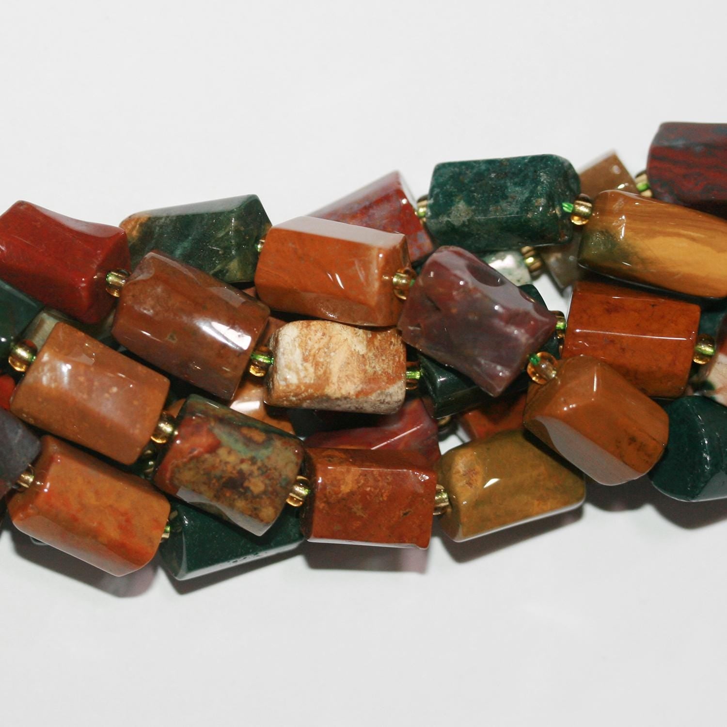 Perles tubulaires à facettes en jaspe St Ocean de 15 pouces, 13 x 10 mm environ - Longueur du fil : 39 cm.