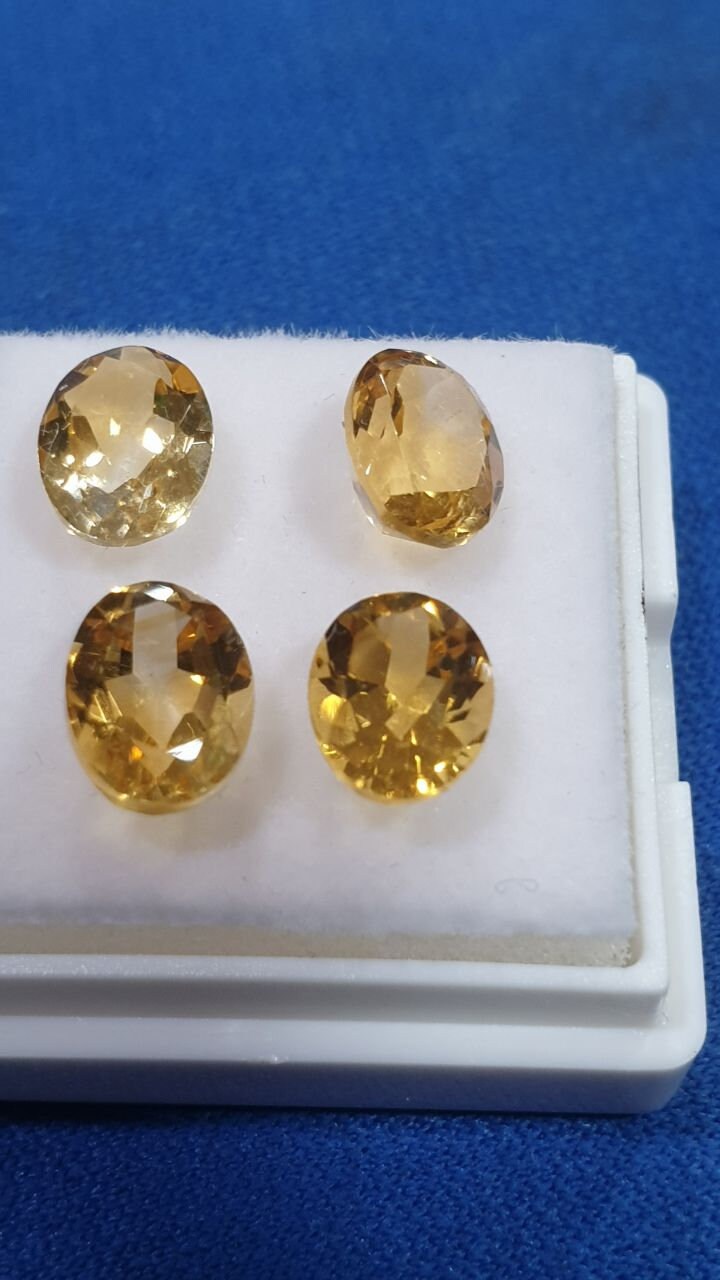 Lot de citrines ovales à facettes 8x6 mm (4 pièces). Pierres précieuses en vrac, prix de gros.