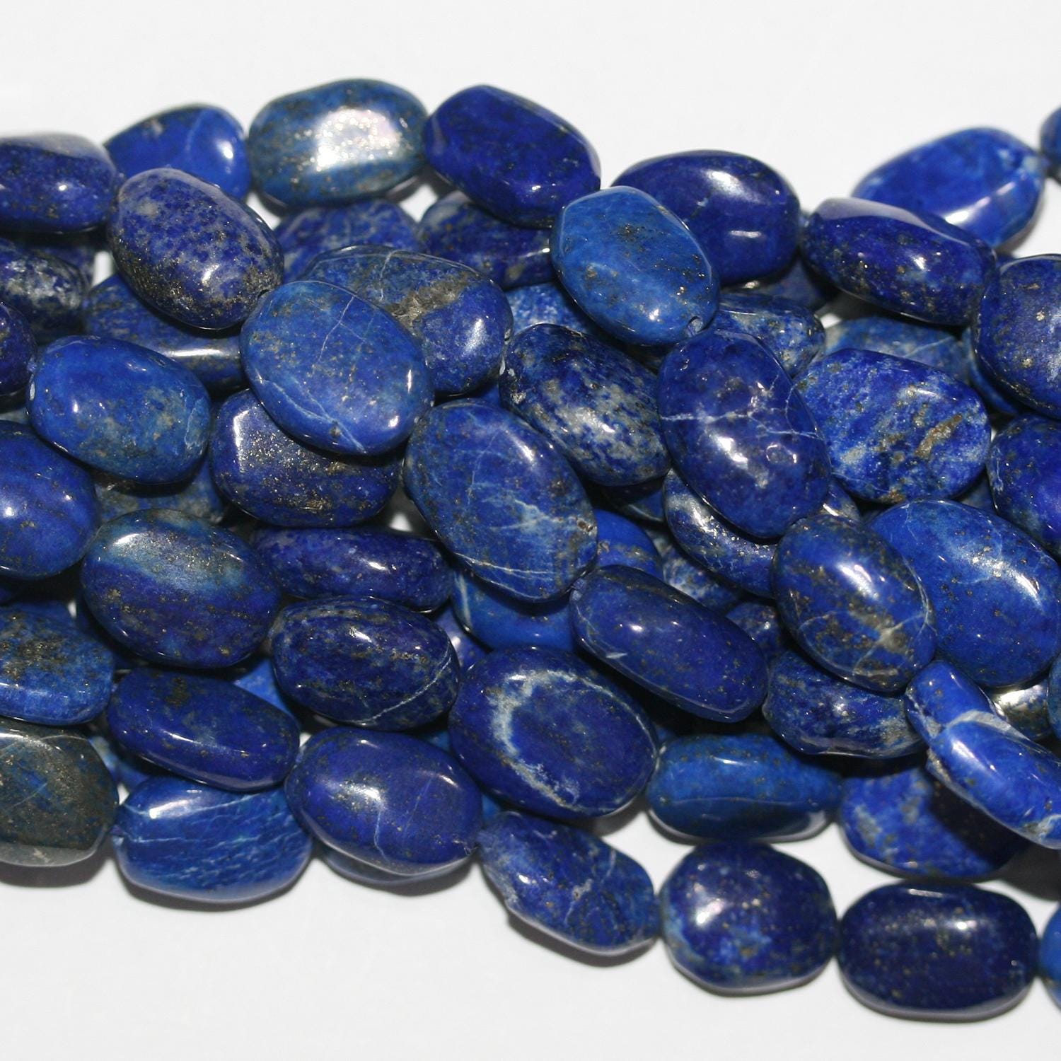 Cuentas ovaladas lisas graduadas de lapislázuli de 40 cm (16"), 10 x 7-18 x 13 mm (aprox.), tira de 40 cm