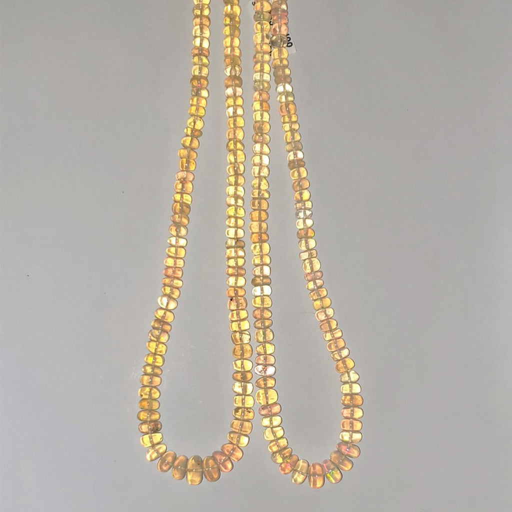 Perles rondelles lisses dégradées en opale éthiopienne St, 16 pouces (environ 42 cm), de 5 x 2 à 8 x 5 mm. Longueur du fil : 42 cm.