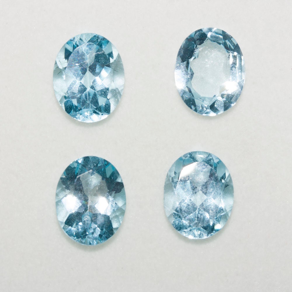 Lote de 4 piezas de topacio cielo ovalado facetado de 10 x 8 mm (4 piezas).