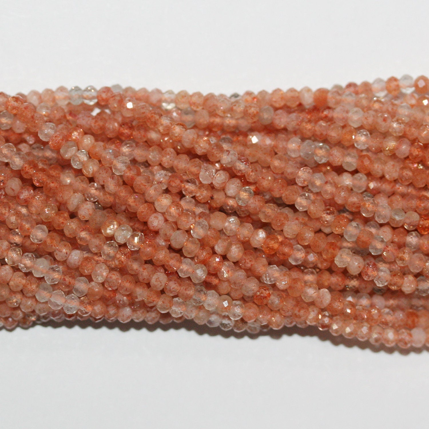 Perles rondelles à facettes en pierre de soleil St 15" 3x2mm.-Rig 39cm.