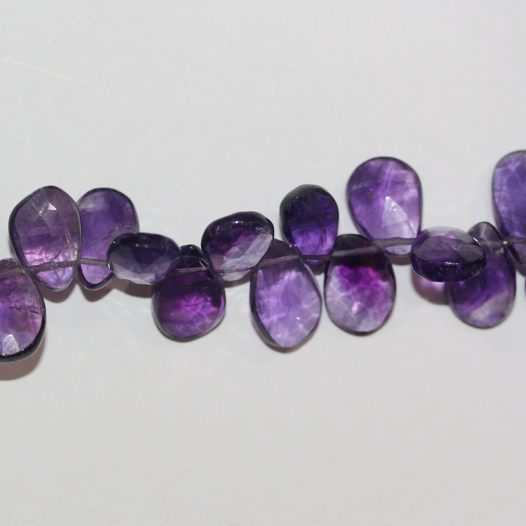 Cuentas de amatista facetadas de 8" x 7 x 5 mm (aprox.), hilo de 20 mm.