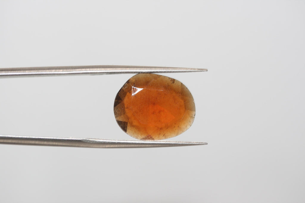 Faceted Oval Hesonite Garnet Cabochon 16.5x13.5mm. (7.12ct.)