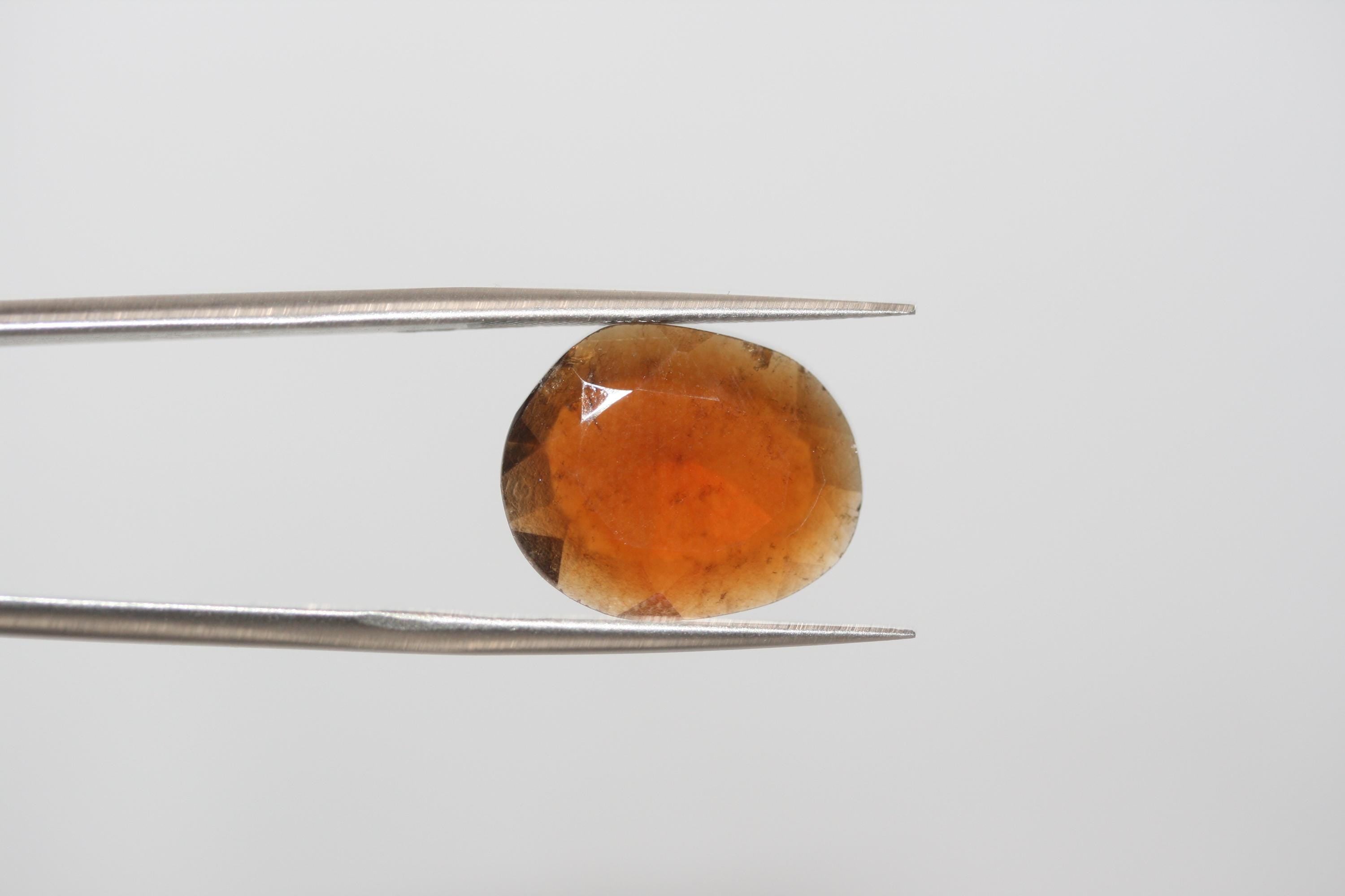 Faceted Oval Hesonite Garnet Cabochon 16.5x13.5mm. (7.12ct.)