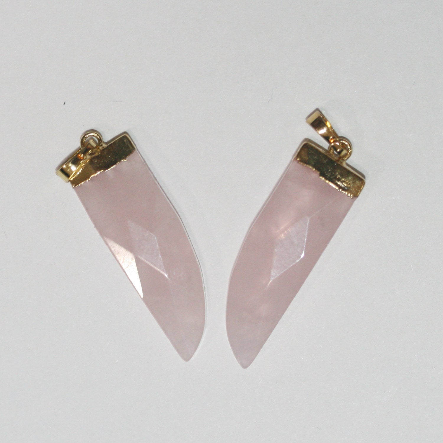 Pendentif bâtonnet à facettes en quartz rose 30x10mm.( 1 pièce )