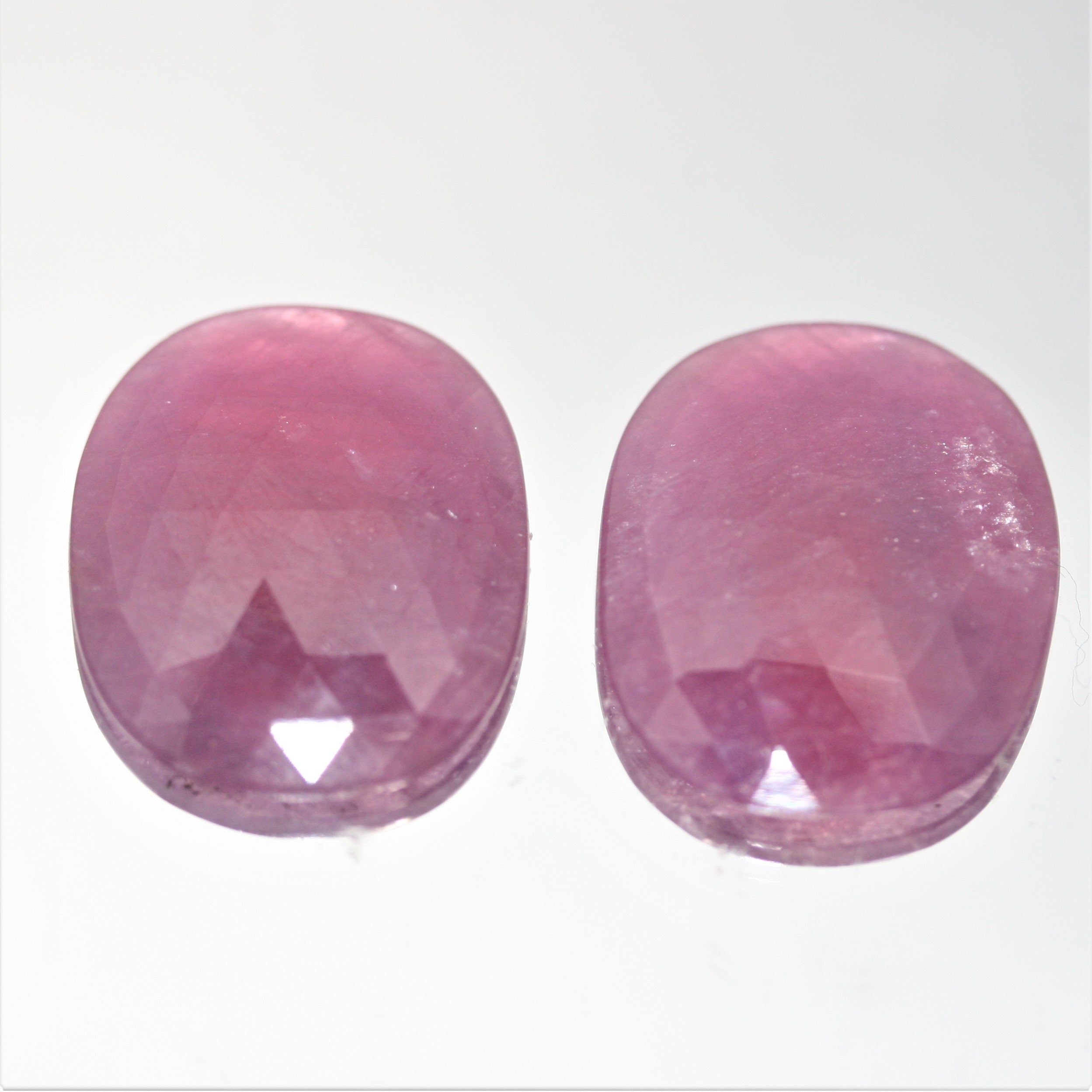 Ruby Faceted Oval Cabochon 23.5x19mm. (34 ct).- 1 Pair