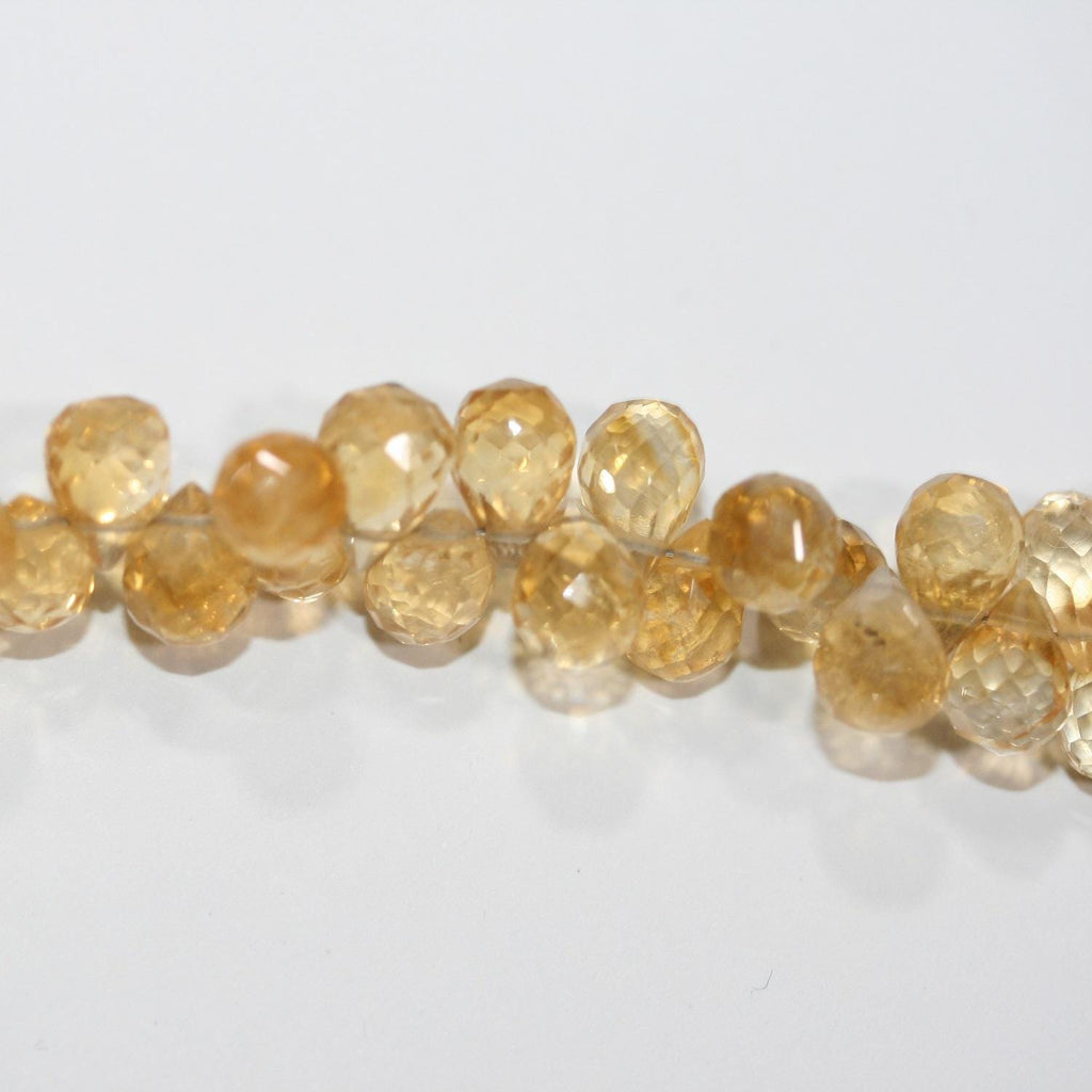 Perles en citrine facettées en forme de goutte, 7 x 5 mm environ, 20 cm de long.