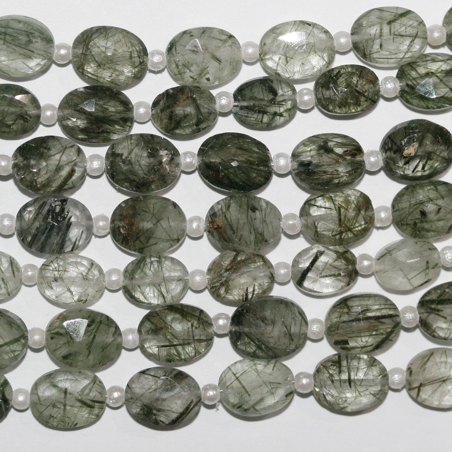 Perles ovales à facettes en quartz rutile vert St 8" 9x7mm.-Rig 20cm.