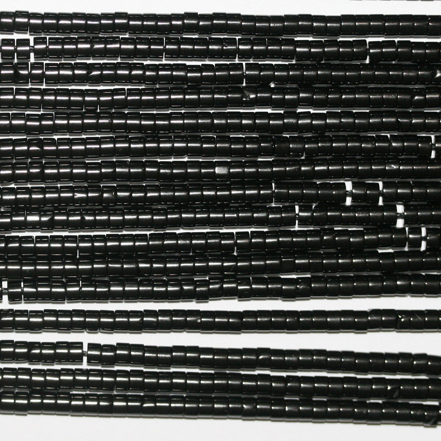 Perles disques lisses St Jet 15" 3x2mm.-Bracelet 39cm.