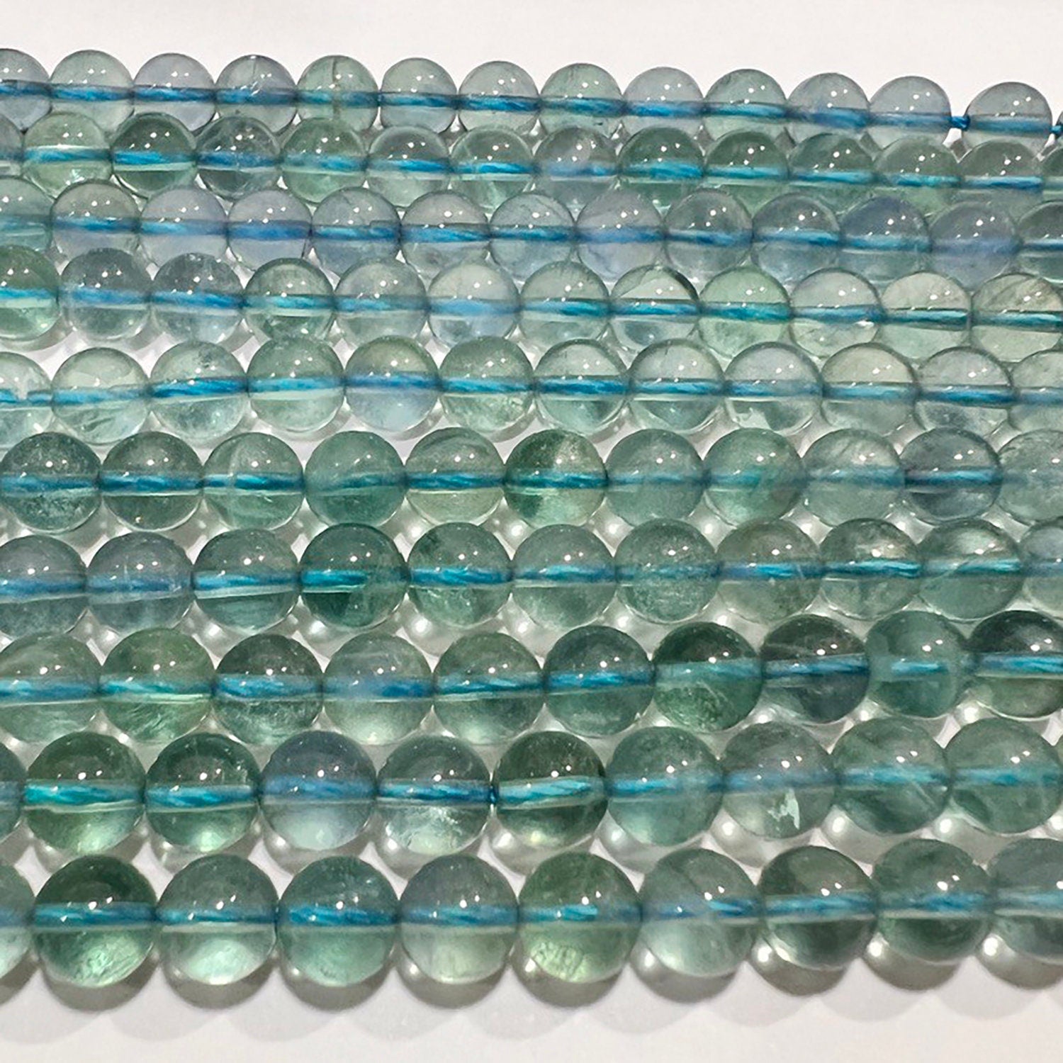 Cuentas redondas lisas de fluorita azul St. de 16 pulgadas, 6 mm, tira de 40 cm.