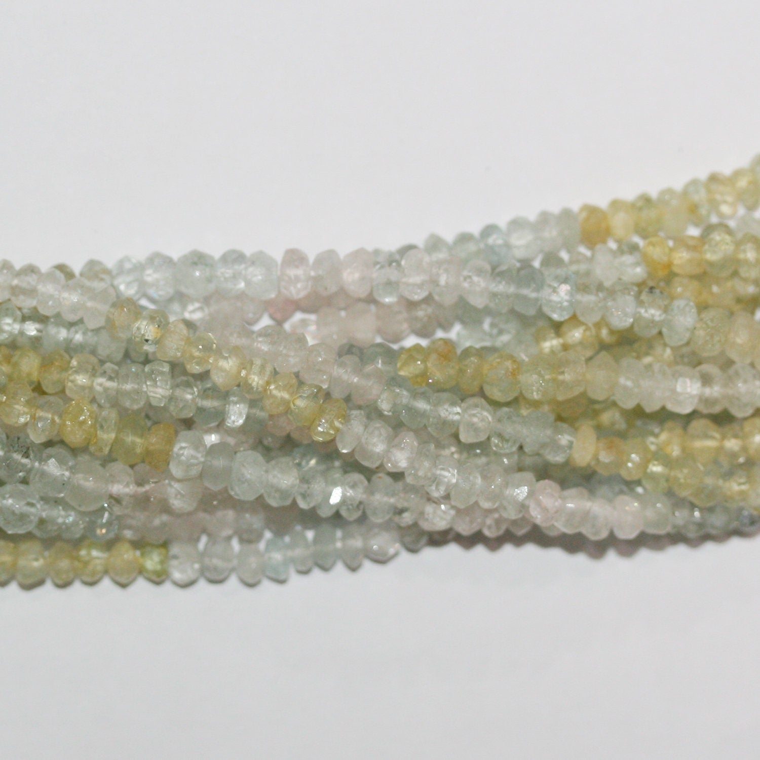 14" St Multi Beryl Faceted Rondelle Beads 4x2mm. Strand 37cm.