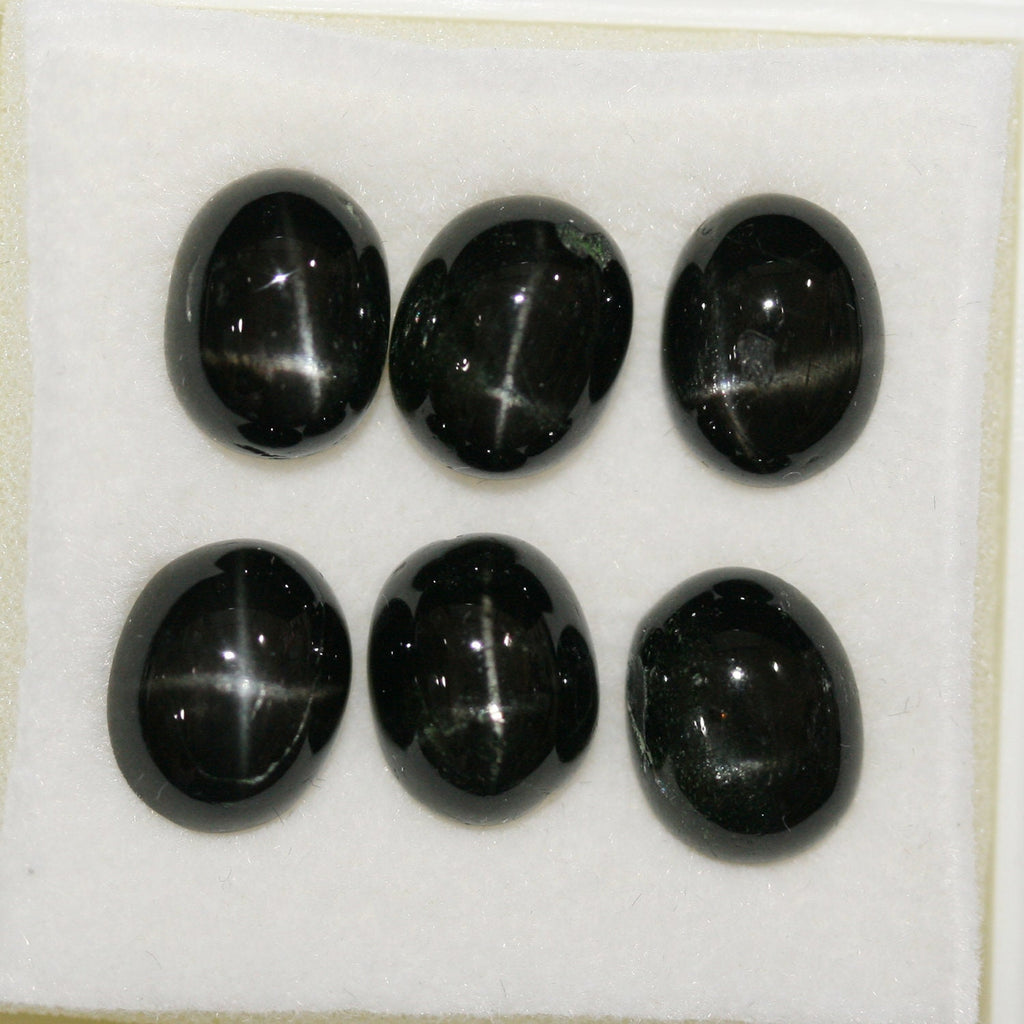 Lote de 6 cabujones ovalados de diópsido estrella de 10 x 8 mm. (6 uds.)