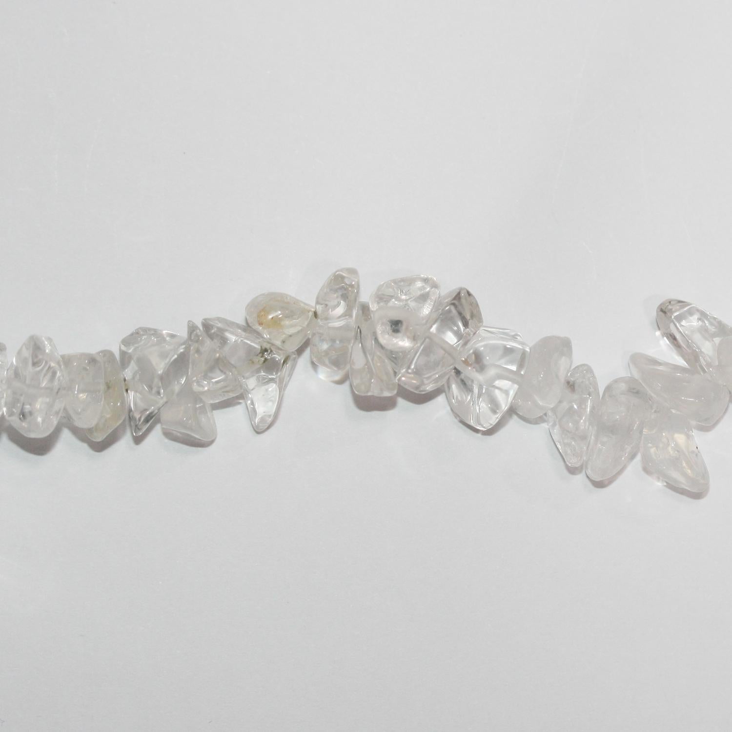 Cuentas lisas de cuarzo cristal de roca de 33" (10 x 8 mm). Hilo de 85 cm aprox.