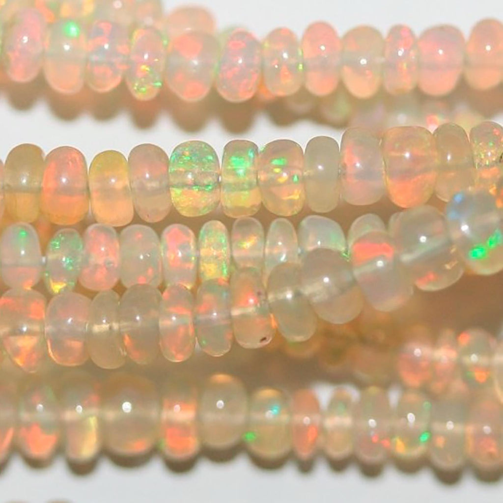 Perles rondelles lisses et graduées en opale éthiopienne St, 40 cm (16 pouces), dimensions : 2,5 x 1,5 à 6 x 3 mm. Longueur du fil : environ 40 cm.