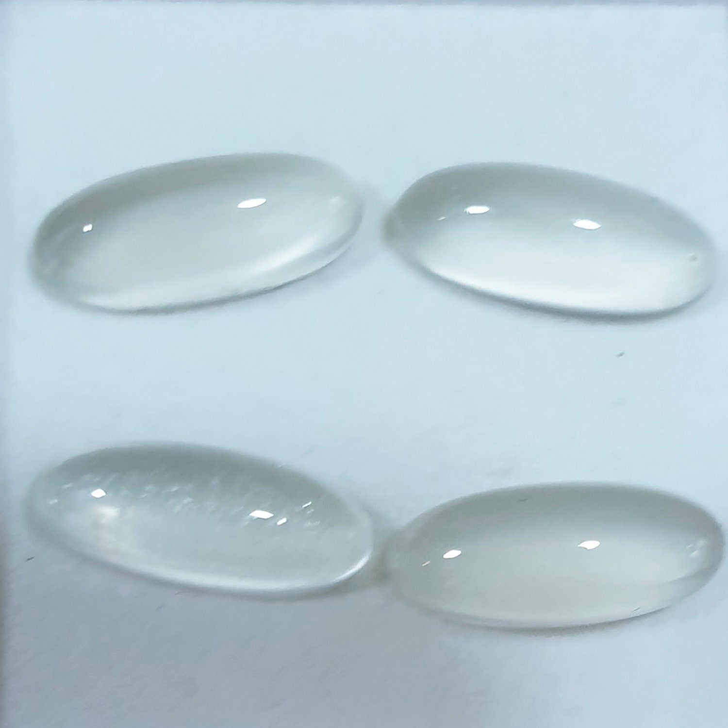Lote de 4 cabujones de piedra lunar marquesa de 15 x 6 mm. (4 piezas)