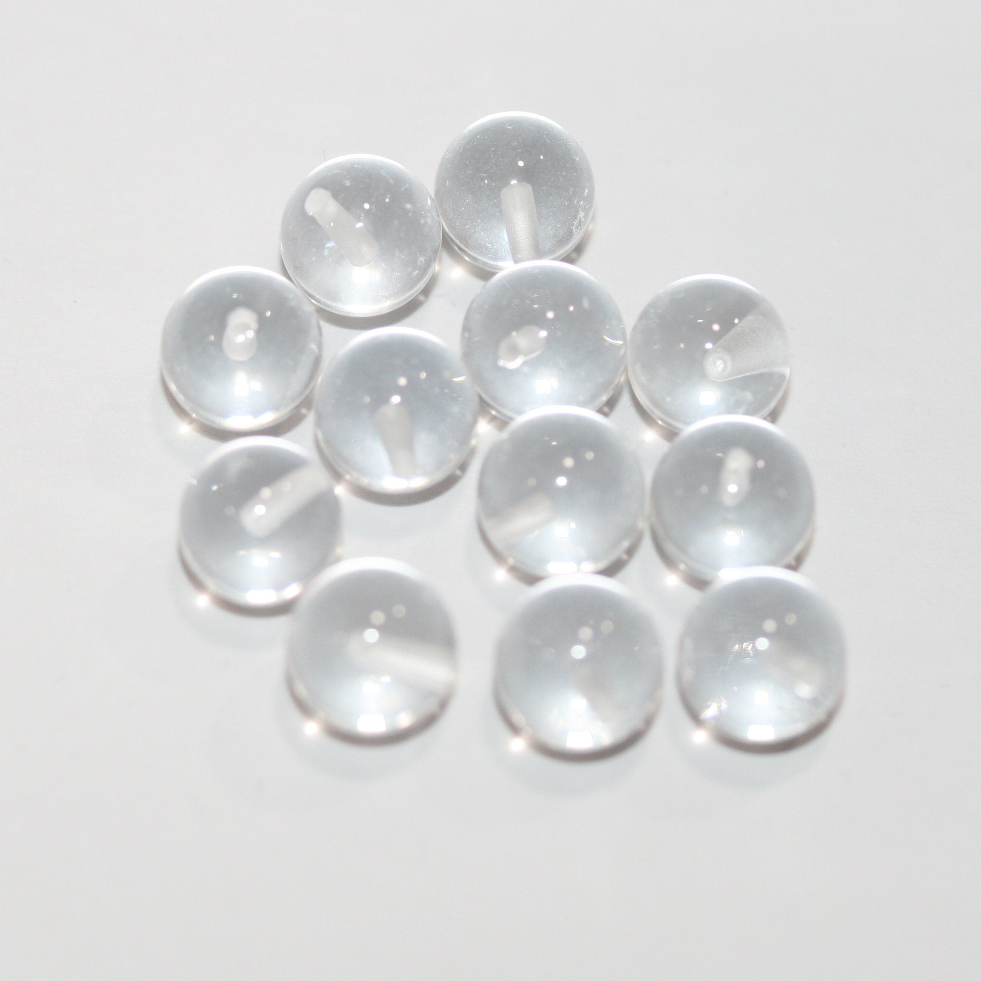 Perles rondes en quartz cristal de roche, demi-percées, 8 mm (4 paires).