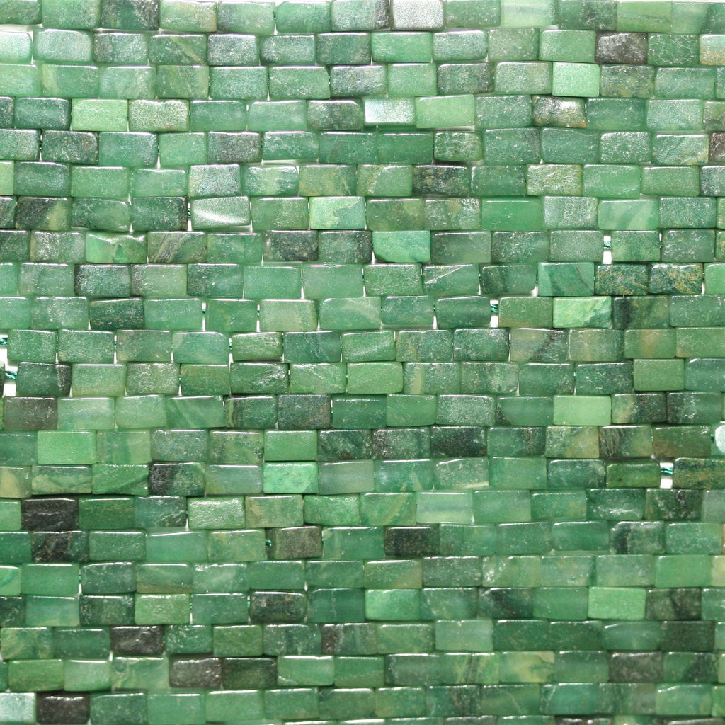 15" Perles prismatiques lisses en grenat vert St 4x2mm.- Brin 39cm.