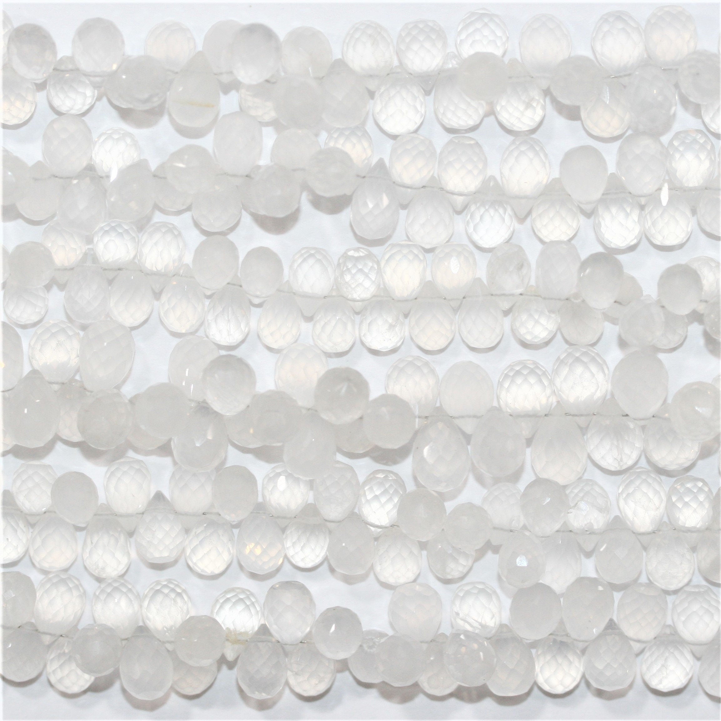 Perles en cristal de roche St 8" à facettes en forme de goutte, 9 x 6 mm - Fil de 20 cm.