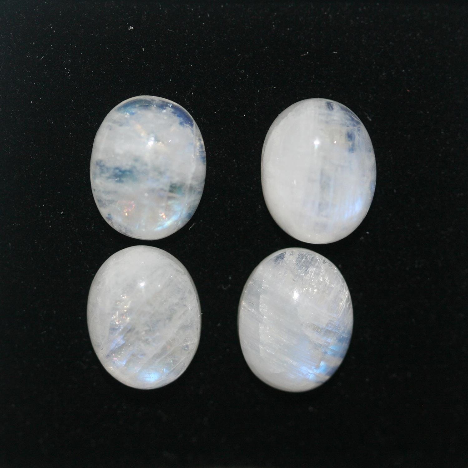 4 cabochons ovales lisses en pierre de lune 10x8mm.- (4 pièces)