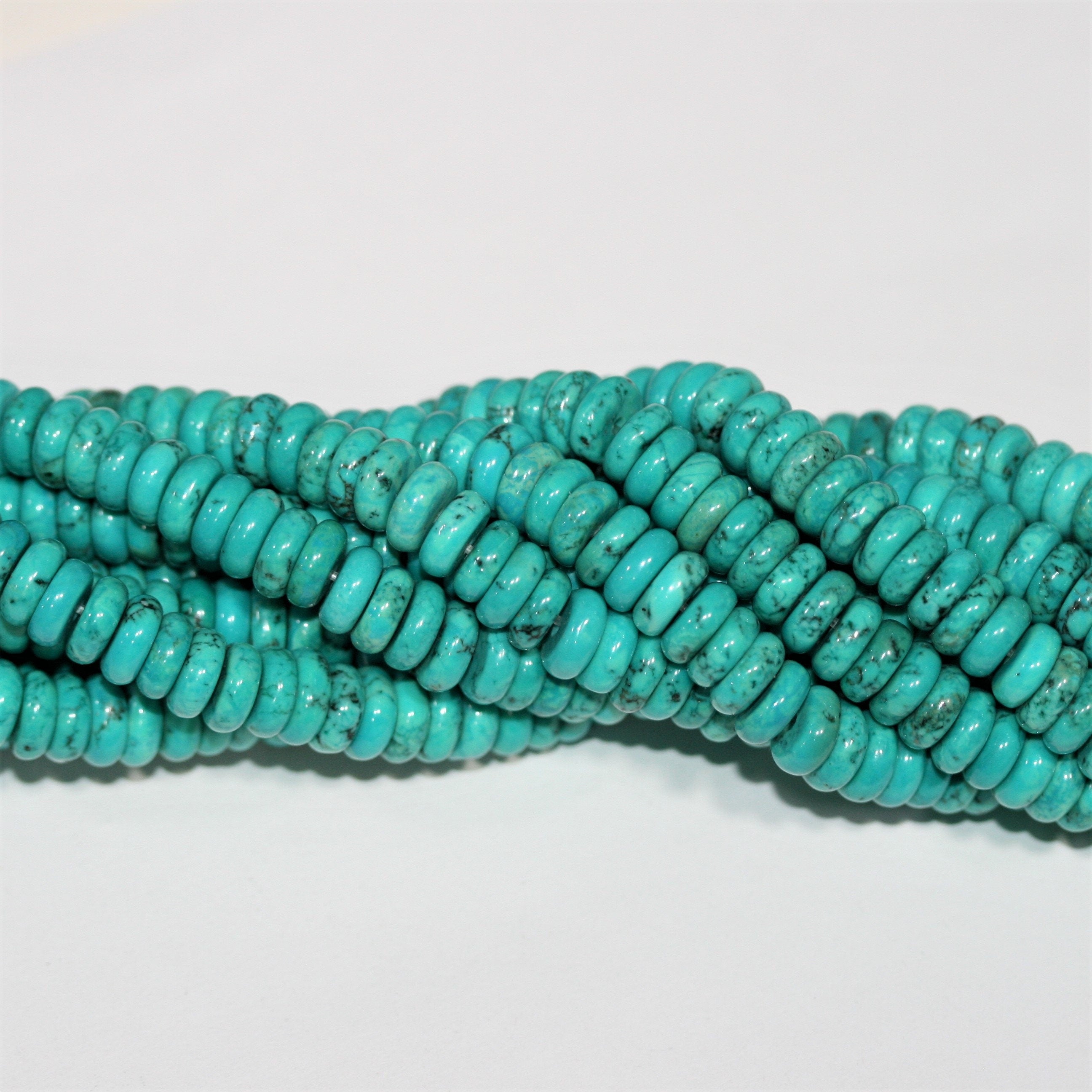 Cuentas redondas lisas de turquesa St. de 16" de 8 x 3 mm - Hilo de 41 cm.