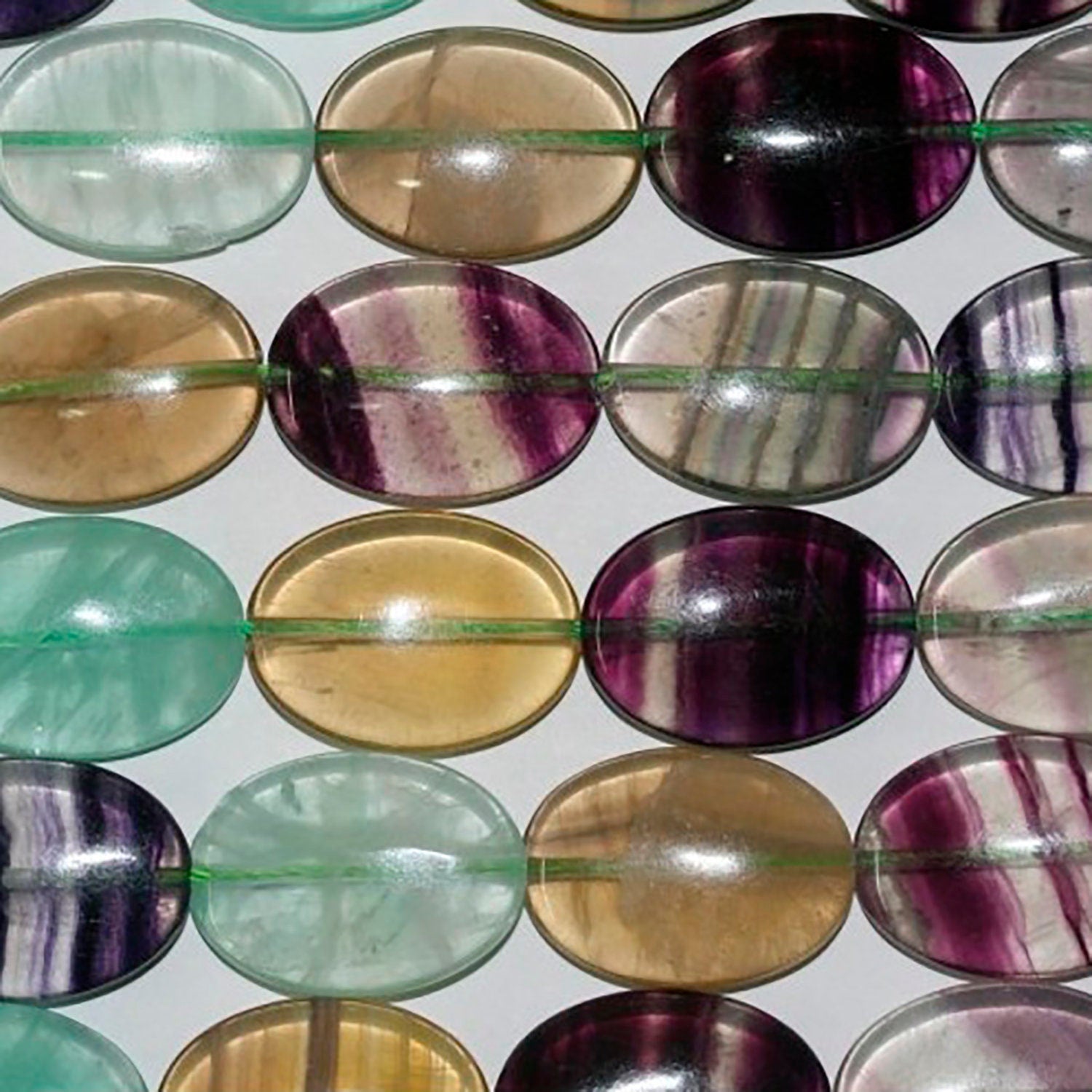 Cuentas ovaladas lisas de fluorita de 16" (25 x 18 mm) - Hilo de 40 cm