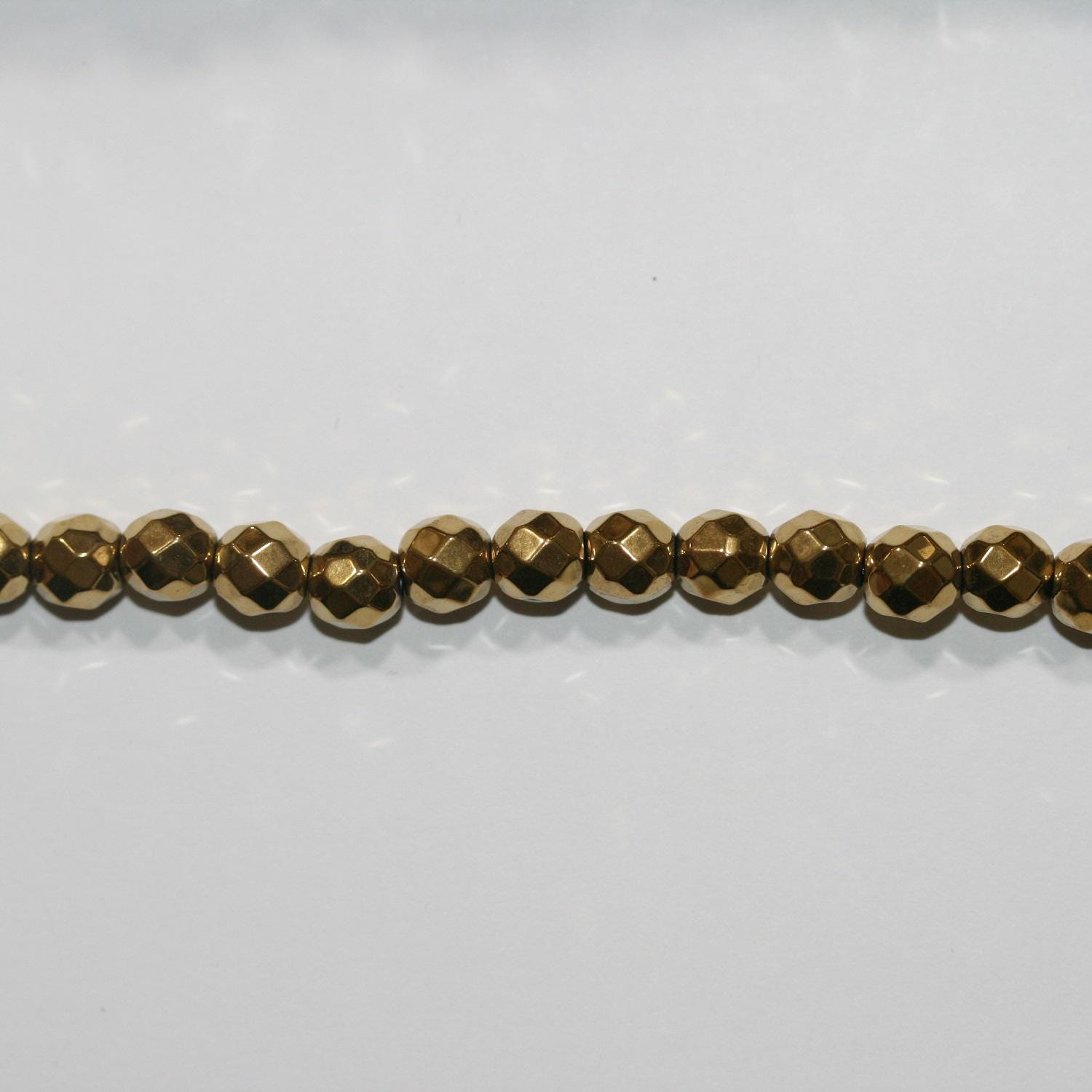 16" St Gold Hématite Perles Rondes Facettées 6mm.-Rig 40cm.