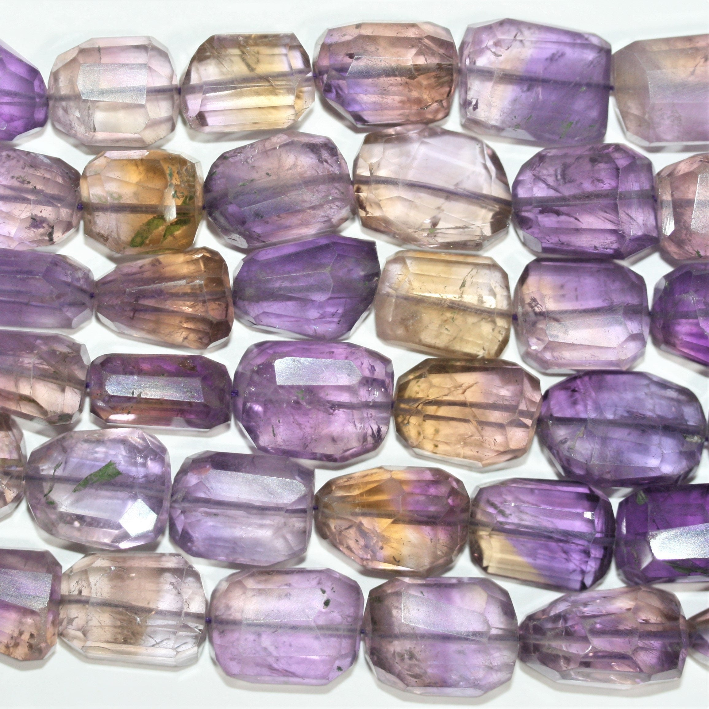 Cuentas de pepitas facetadas graduadas de ametrina St. de 20", 13-20 mm aprox., hilo de 52 cm.