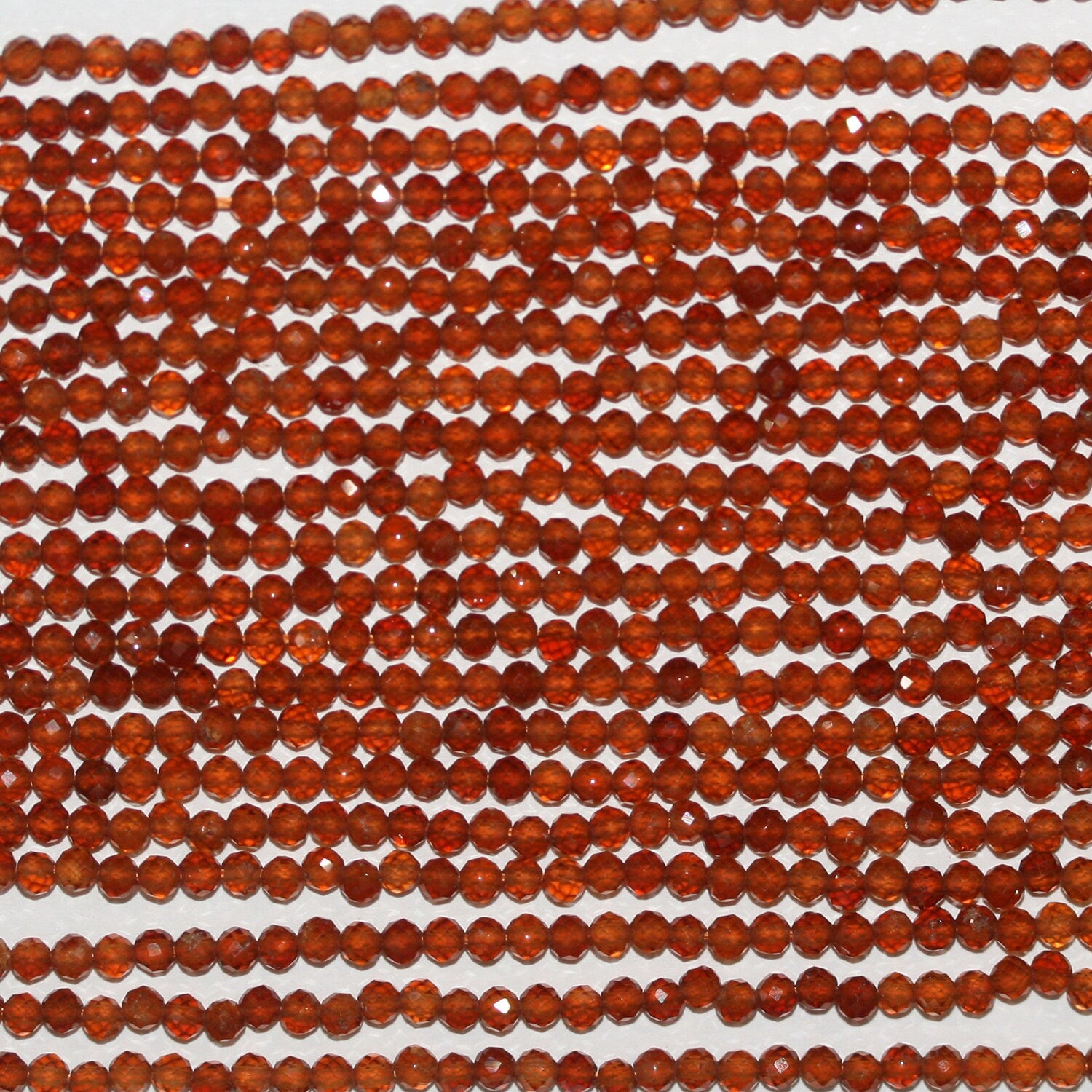 13" St Hessonite Garnet Faceted Round Beads 3mm.-Strand 39cm