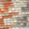 Perles ovales lisses en pierre de lune multicolore de 35,5 cm (14 pouces), 9 x 6 mm environ. Longueur du fil : 38 cm.