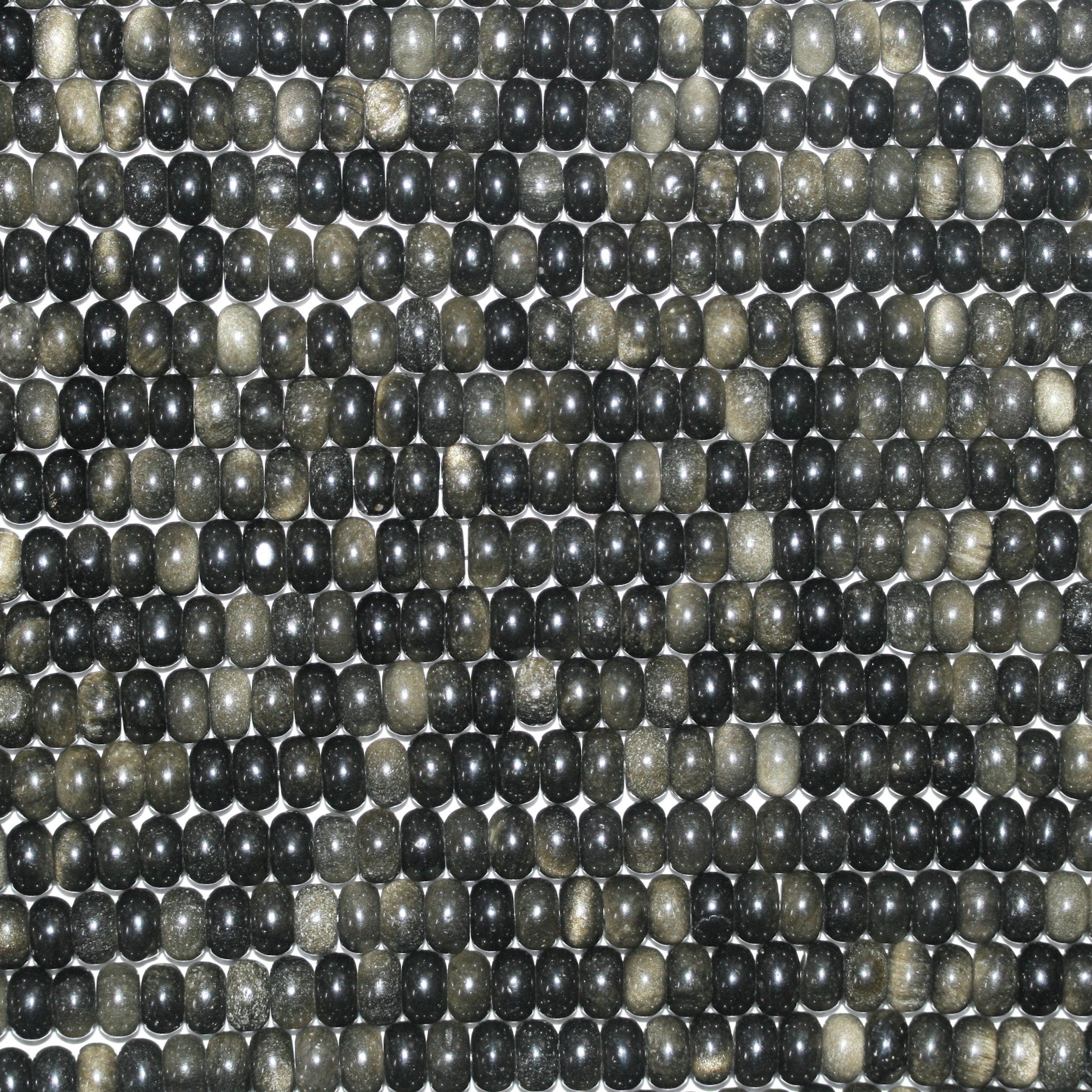 Perles rondelles lisses en obsidienne St 15" 8x5mm.- Brin 39cm.