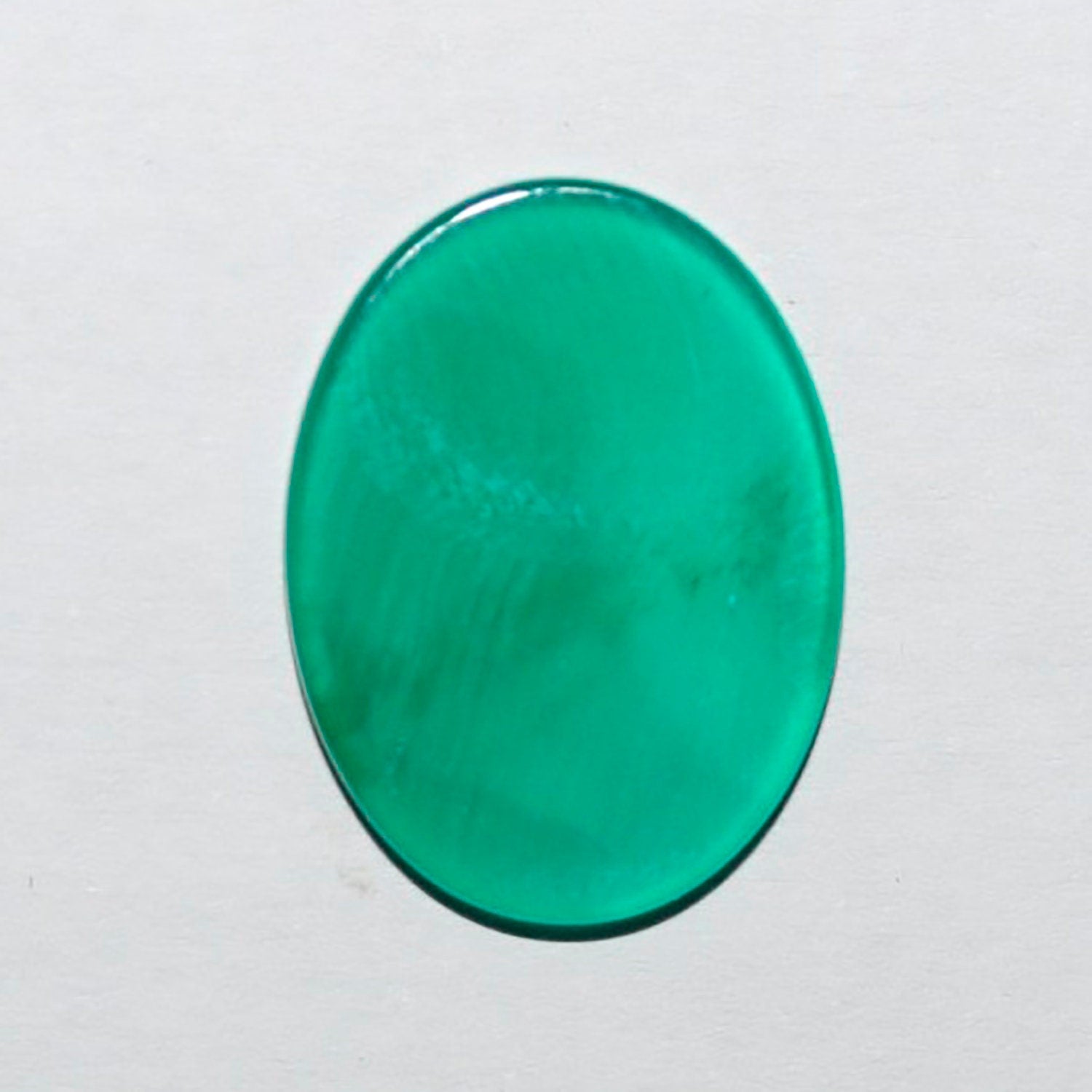 Lote de 4 cabujones ovalados planos de ónix verde de 16 x 12 mm.