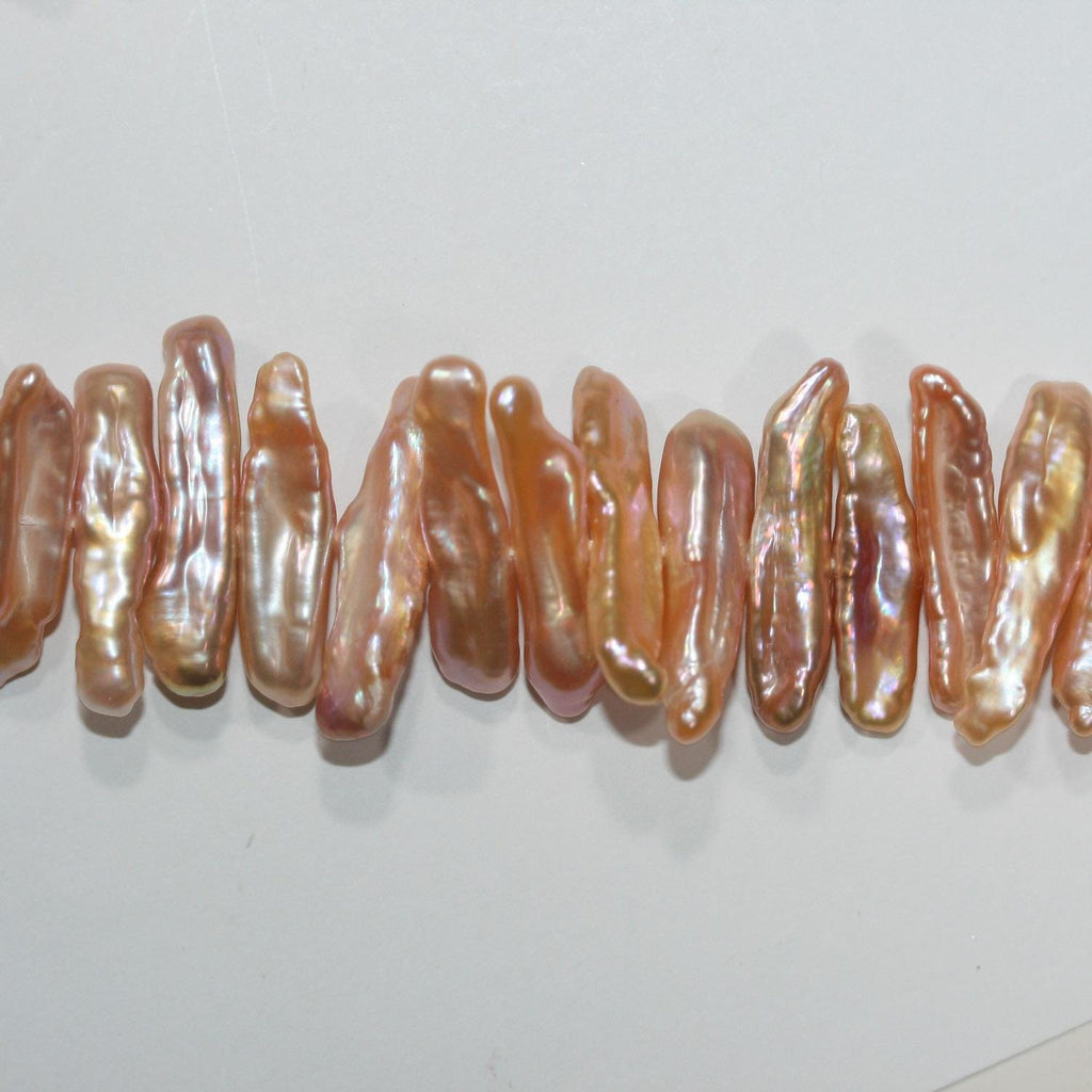 Perlas de agua dulce Biwas color salmón de 40 cm, 24 x 6 mm (aprox.), tira de 40 cm - Precios al por mayor de perlas naturales