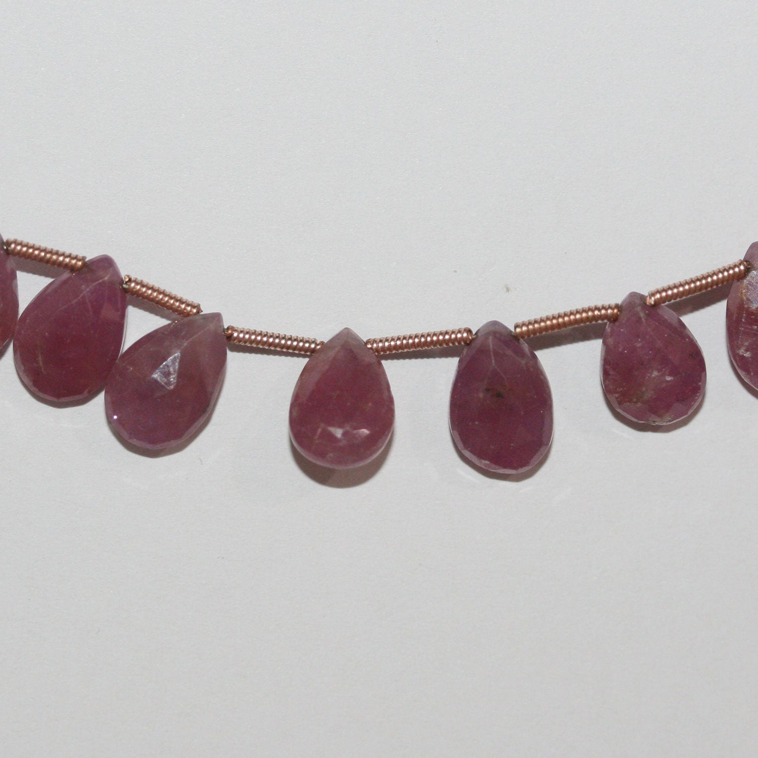 Perles en forme de goutte facettées St Ruby 8" 10x7mm.-Rig 20cm.