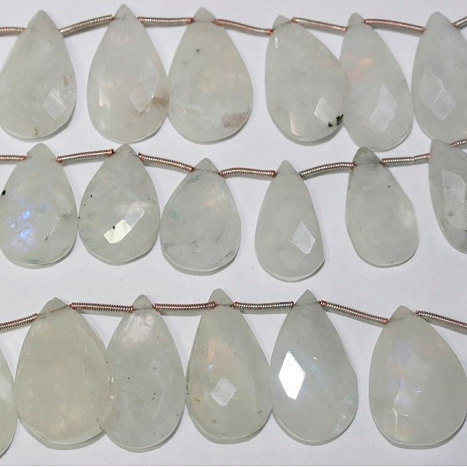 Cuentas de piedra lunar facetadas de 18 cm (22 x 13 mm). Longitud aproximada: 20 cm.