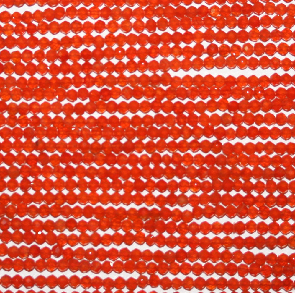 14" Brin de perles rondes à facettes en cornaline de feu de 2 mm.