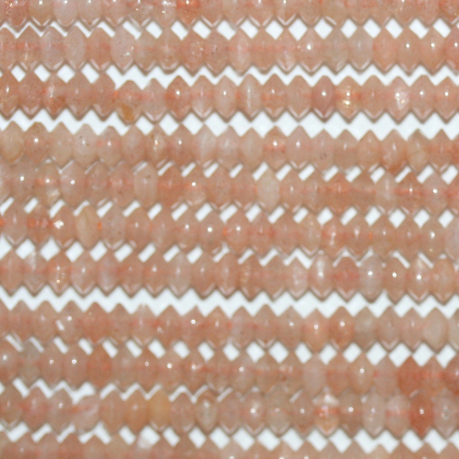 Perles rondelles à facettes en pierre de lune pêche de 15 pouces, 4 x 3 mm. - Fil de 39 cm.