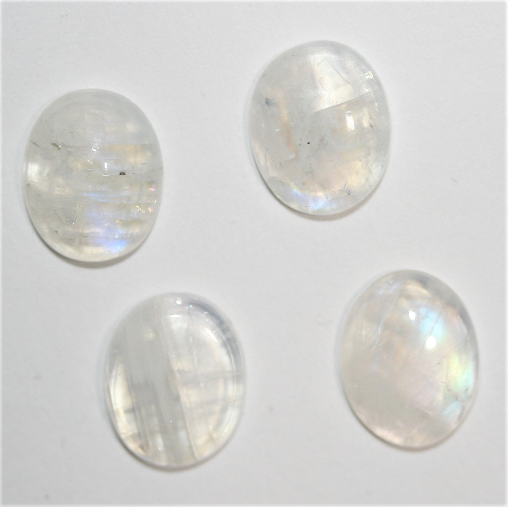 4 cabochons ovales lisses en pierre de lune 10x8mm.- (4 pièces)