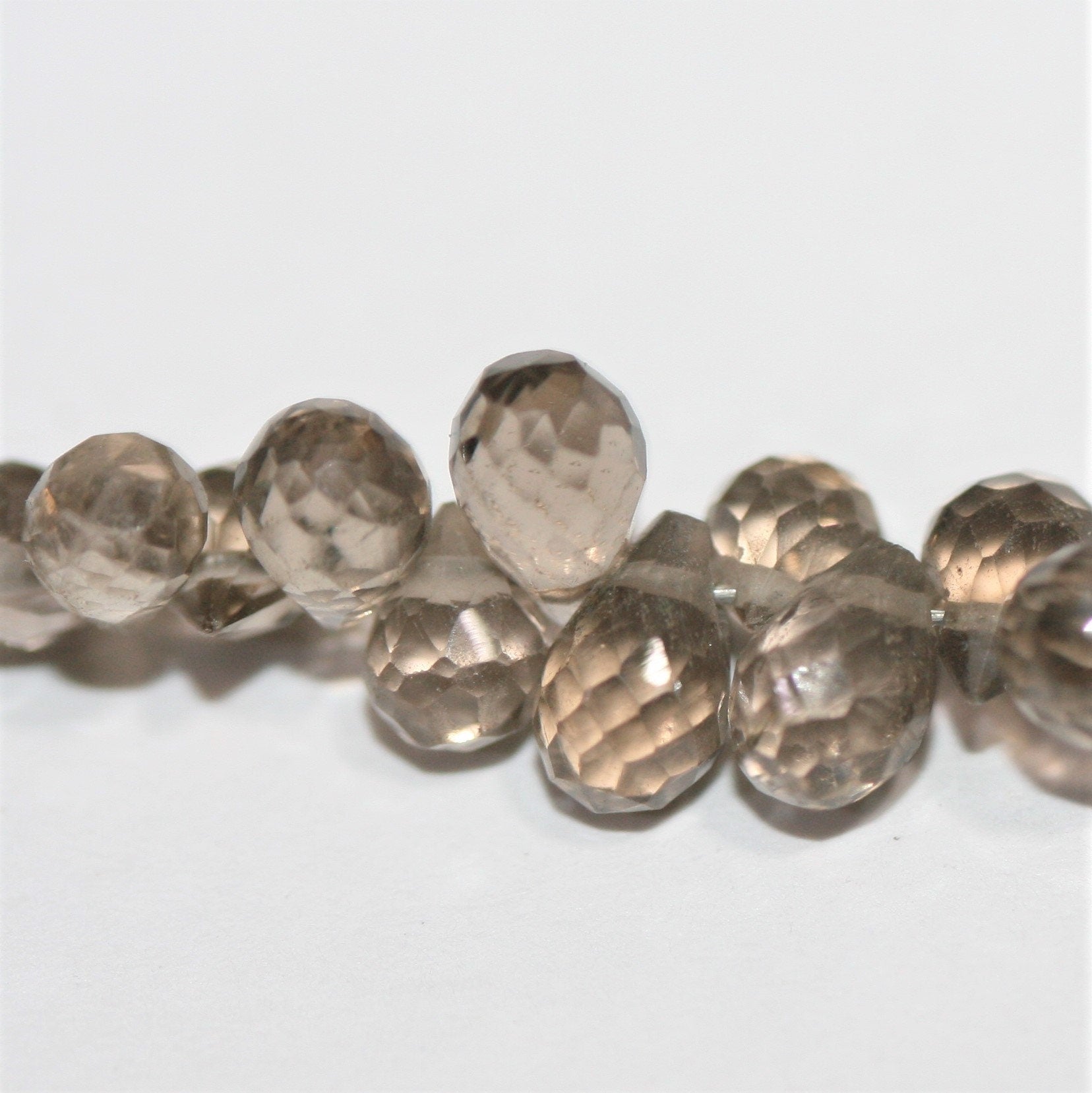 Perles en quartz fumé facettées St 8" 5x3mm.-Rig 20cm.