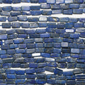 Perles prismatiques en brique lisse de lapis-lazuli de 14 pouces (environ 7 x 4 mm). Longueur du brin : 37 cm.